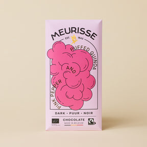 Meurisse dark chocolate bar with pink pepper and puffed quinoa, wrapped in soft pink packaging featuring bold illustrated pink clusters, standing upright against a light beige background.