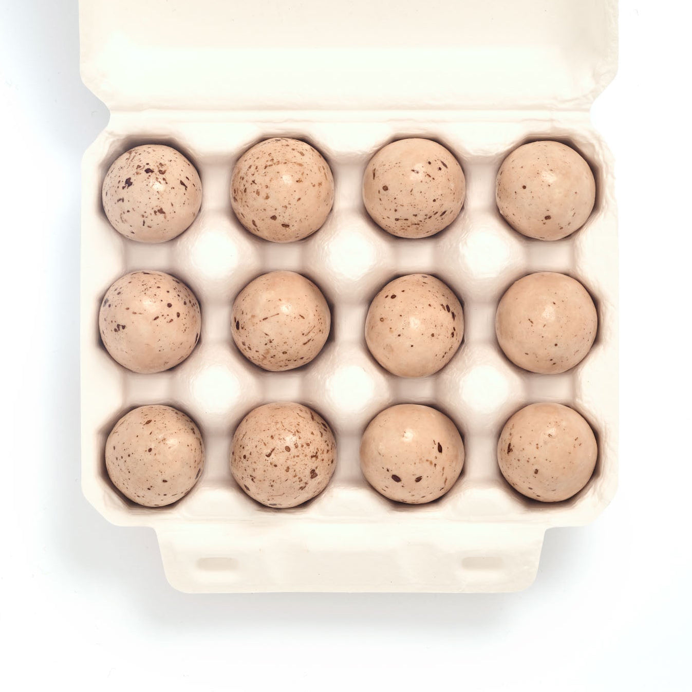Carton of eggs on a white background