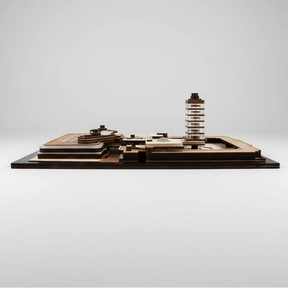 Model of a cityscape with a prominent tower on a white background