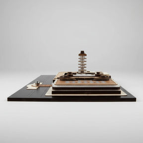 Wooden puzzle on a black base with a white background