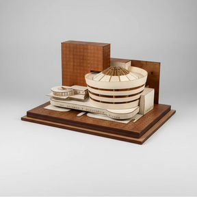 Model of a building with a dome on a wooden base