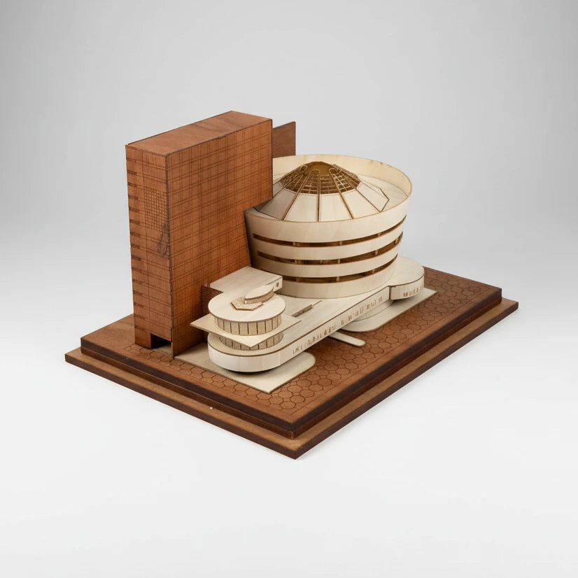 Wooden model of a building on a white background