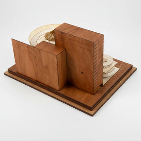 Wooden model of a ship on a white background