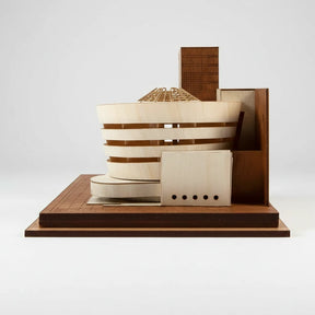 Wooden shelf with decorative items on a white background