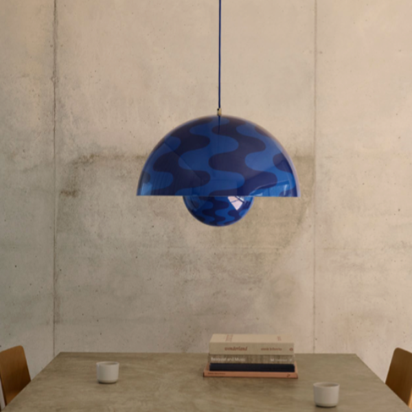 &Tradition, a Danish design brand that merges traditional craftsmanship with contemporary aesthetics, featuring furniture, lighting, and home accessories with timeless appeal.