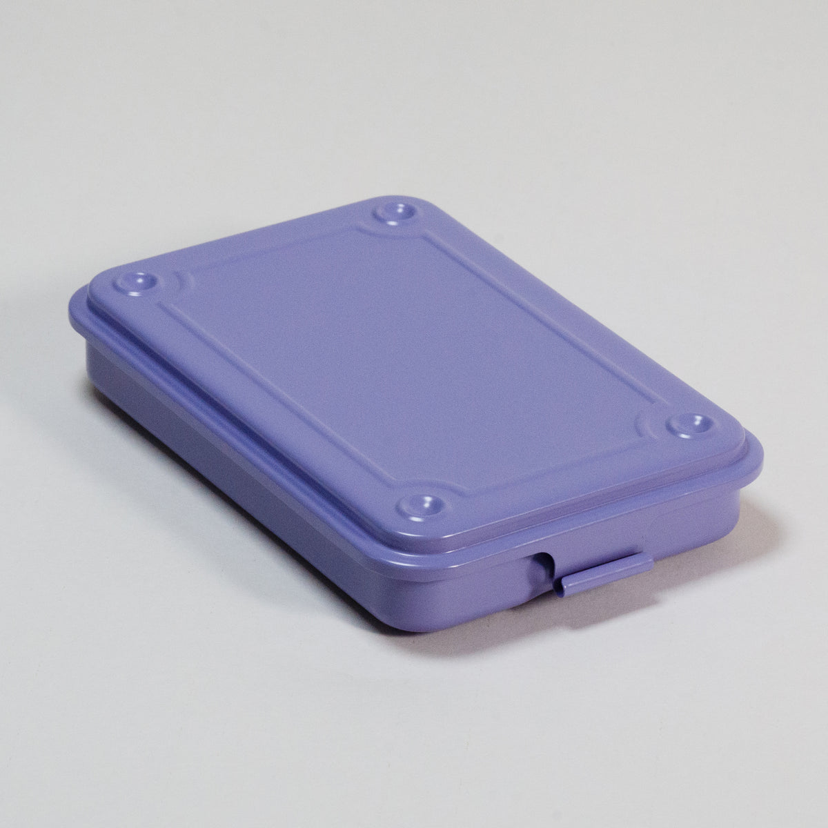Lilac-colored steel stackable storage box with fitted lid, shown closed.