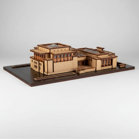 Wooden architectural model on a dark base with a white background