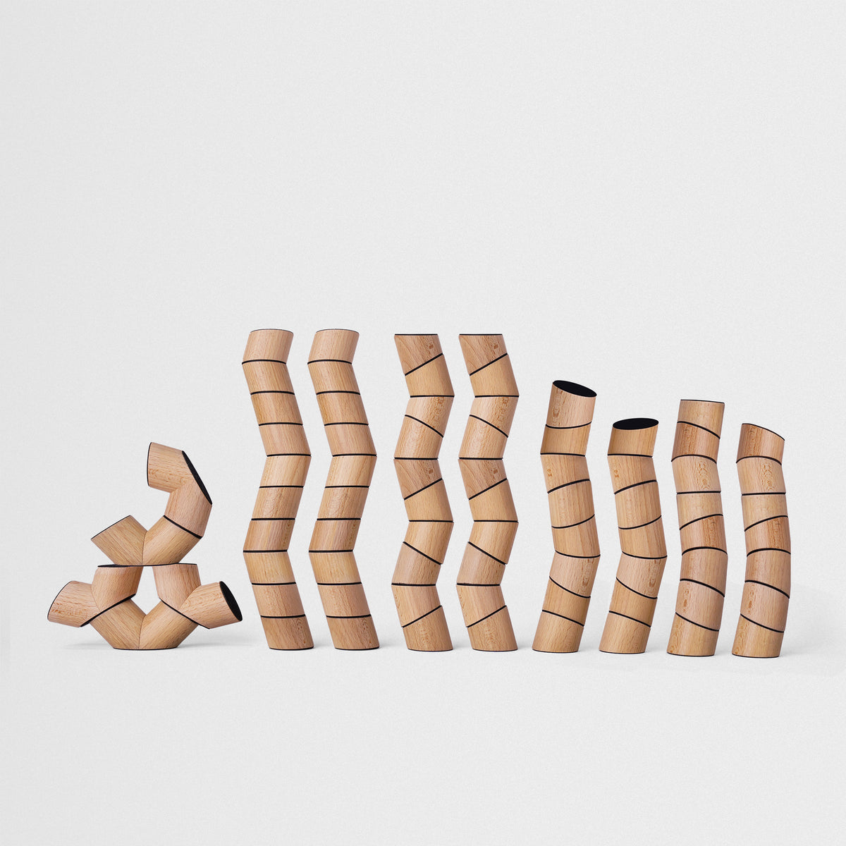 Set of wooden furniture legs with wavy design on a white background