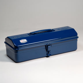 Indigo blue Toyo Y-350 steel toolbox with glossy finish, rounded lid, top carry handle, and single front latch, shown closed on a light gray studio background.