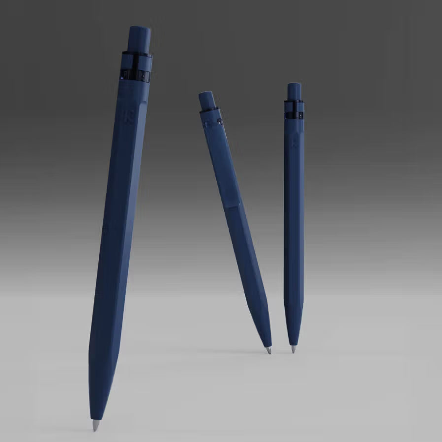 Three blue pens on a gradient gray background