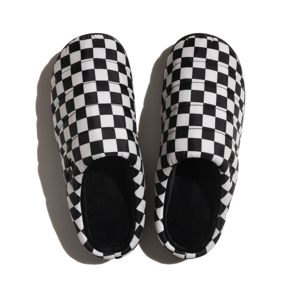 SUBU, a brand known for its stylish, insulated slip-on shoes, offering comfort and warmth with a sleek design, perfect for indoor and outdoor use during colder months.