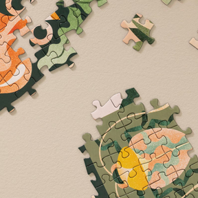 Jigsaw puzzle pieces on a beige background