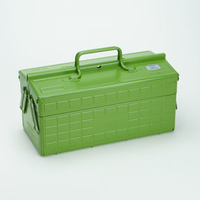 japanese tea green Toyo steel cantilever toolbox, closed, shown at a three-quarter angle with embossed grid panels, folded side arms, and a fixed top carry handle.