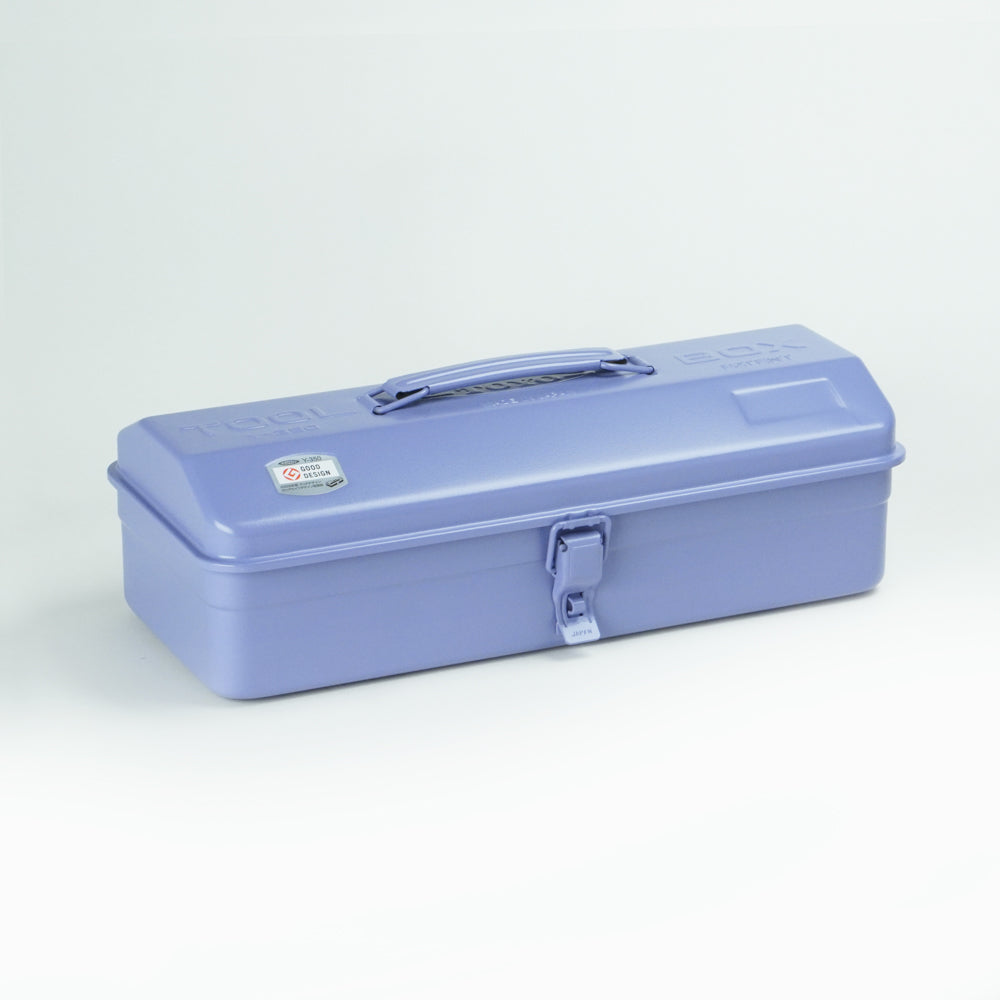 Lilac Toyo Y-350 steel toolbox with smooth matte finish, rounded rectangular lid, integrated top handle, and single front latch, photographed closed on a white studio background.
