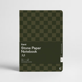 Green checkered notebook with 'Karst Stone Paper Notebook A5' text on a white background
