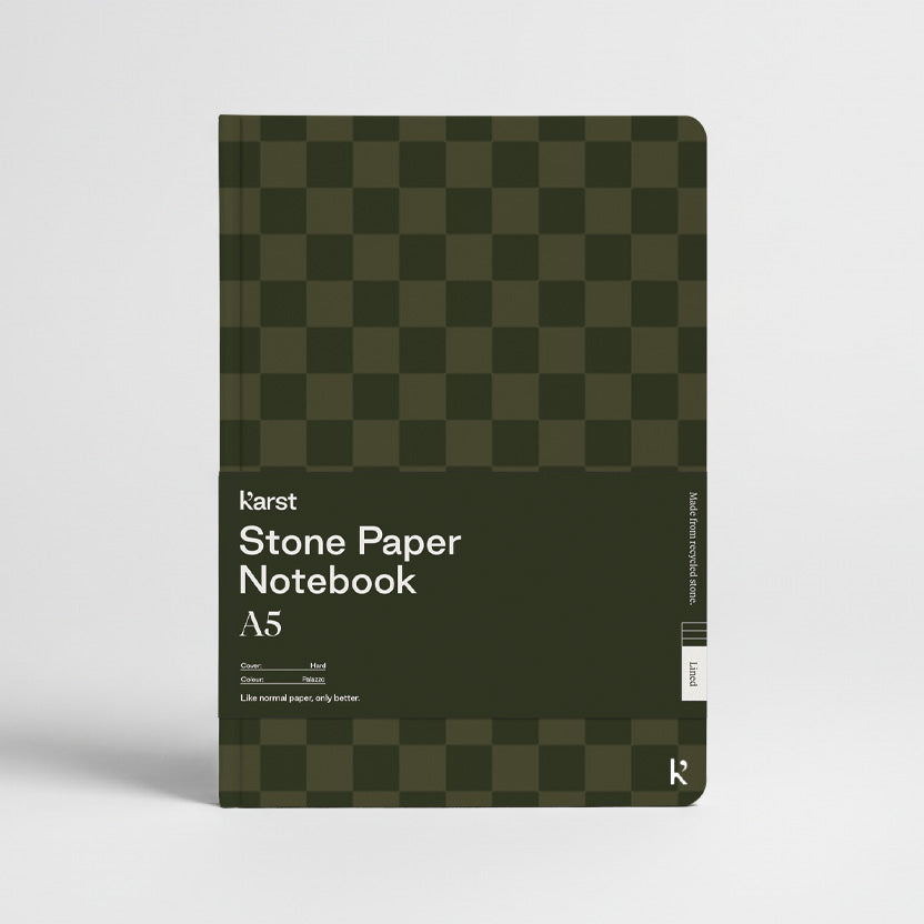 Green checkered notebook with 'Karst Stone Paper Notebook A5' text on a white background