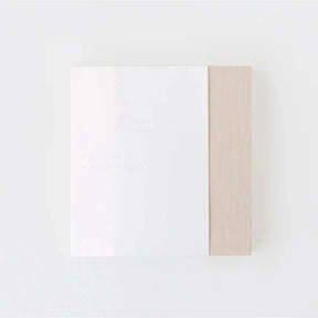 Wooden frame on a white wall