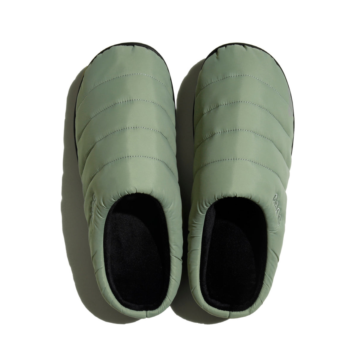 SUBU, a brand known for its stylish, insulated slip-on shoes, offering comfort and warmth with a sleek design, perfect for indoor and outdoor use during colder months.