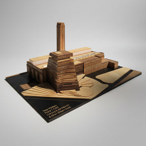 Wooden model of a building on a white background