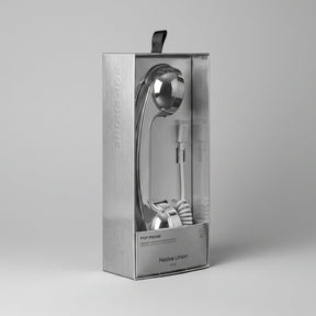 A silver metallic flip-style cord telephone in its original retail packaging, featuring a brushed metal box with a clear window and a black hanging tab.