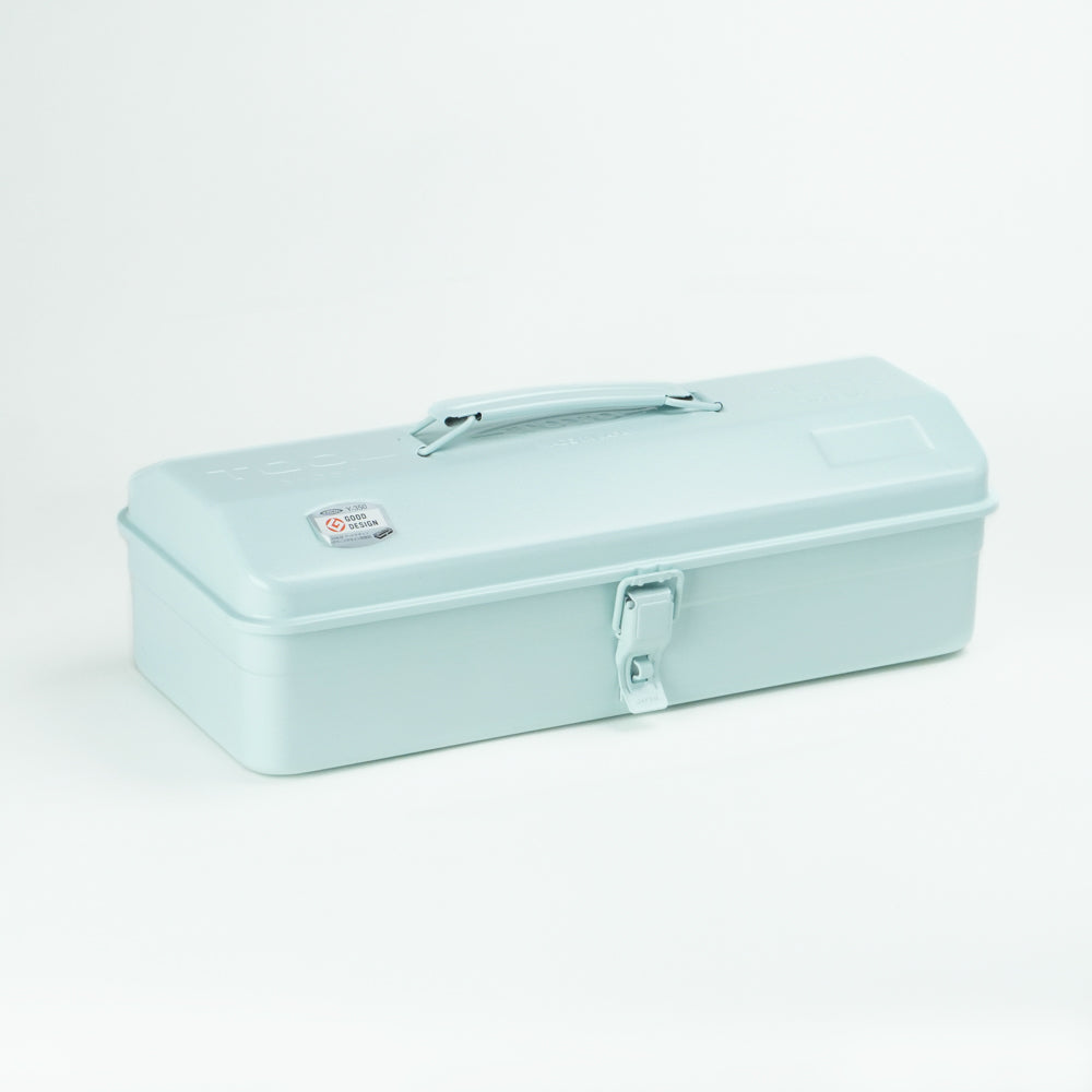 Glacier blue Toyo Y-350 steel toolbox with matte finish, rounded lid, integrated top handle, and single front latch, shown closed on a white studio background.