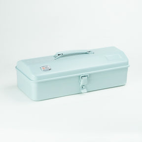 Glacier blue Toyo Y-350 steel toolbox with matte finish, rounded lid, integrated top handle, and single front latch, shown closed on a white studio background.