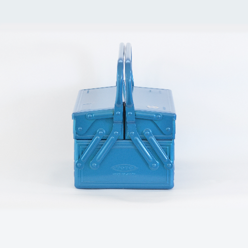 Blue Toyo steel cantilever toolbox shown closed from the front with dual folding handles.