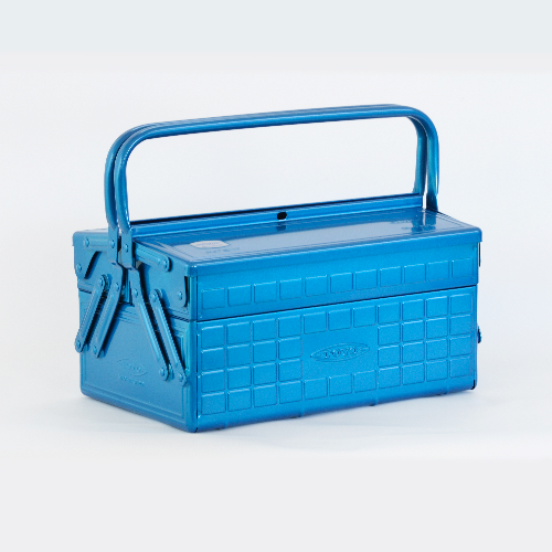 Blue metal toolbox with a raised handle and textured square-pattern exterior, photographed on a white background.