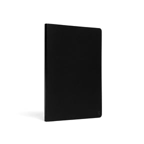 Karst Stone Paper Notebook A5 with a minimalist black soft cover, shown at a slight angled view on a white background.