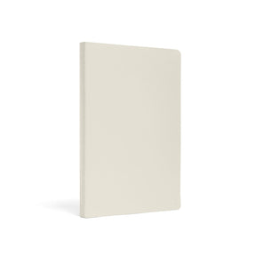 Karst Stone Paper Notebook A5 with a minimalist stone-colored soft cover, shown at a slight angled view on a white background.