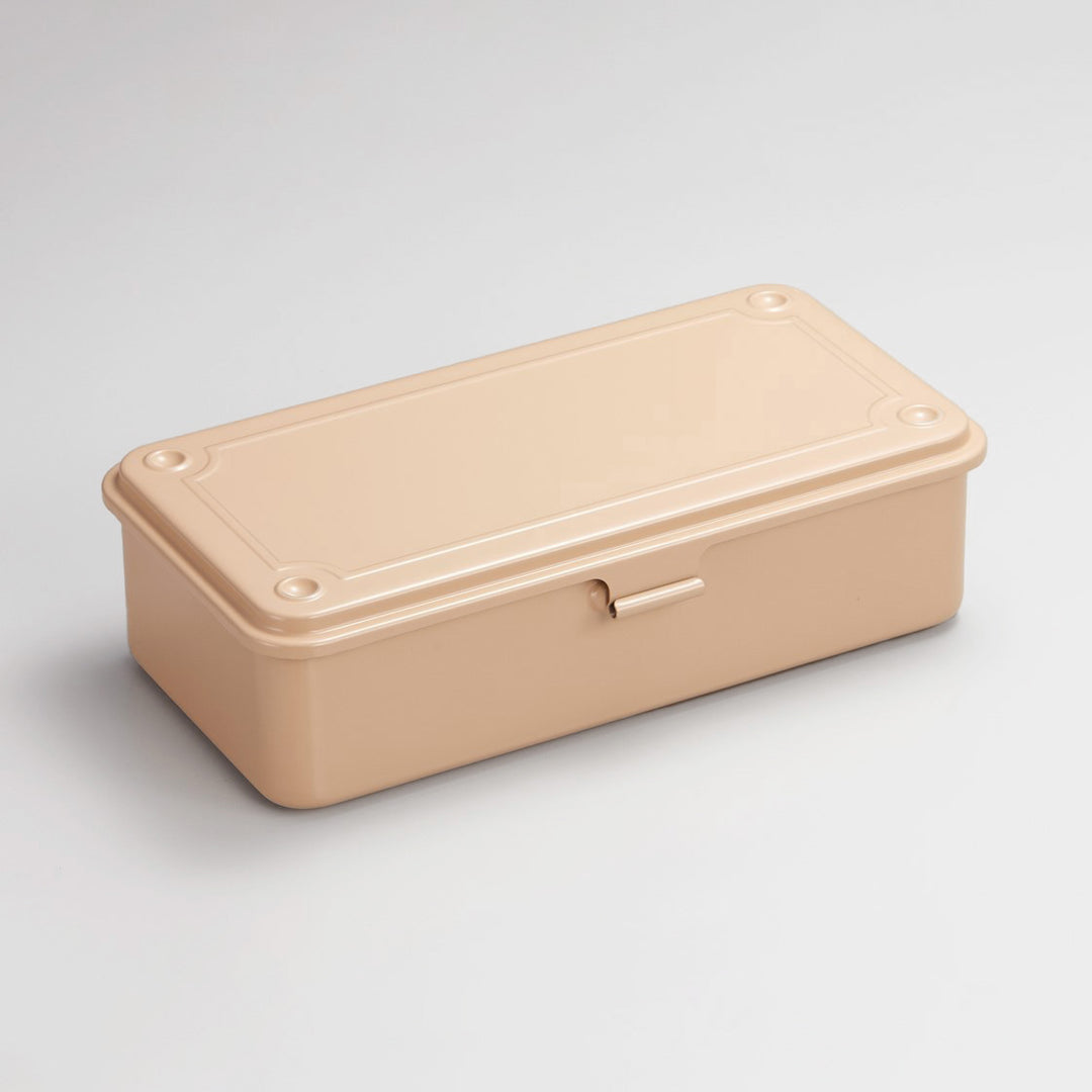 Beige Toyo Steel T-190 compact metal storage box with rounded corners and front pull tab, shown closed on a light neutral background.