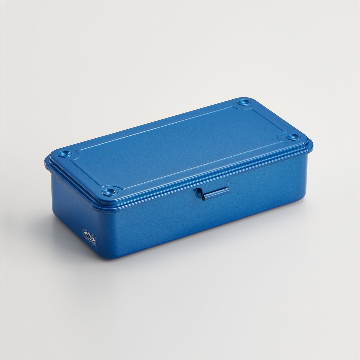 Blue Toyo Steel T-190 compact metal storage box with rounded corners and front pull tab, shown closed on a light gray background.