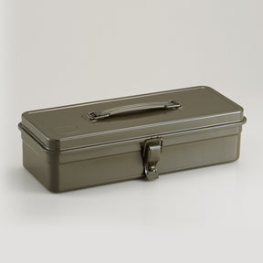 military green Toyo Steel metal toolbox with a low rectangular profile, smooth enamel finish, integrated top handle, and single front latch, photographed closed against a neutral light background.