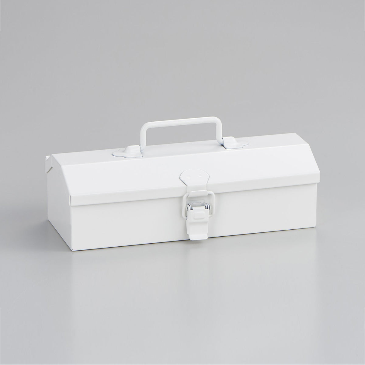 Closed white Toyo Steel Y-17 metal toolbox with a top carry handle and front latch, shown at a slight angle against a clean light gray background.