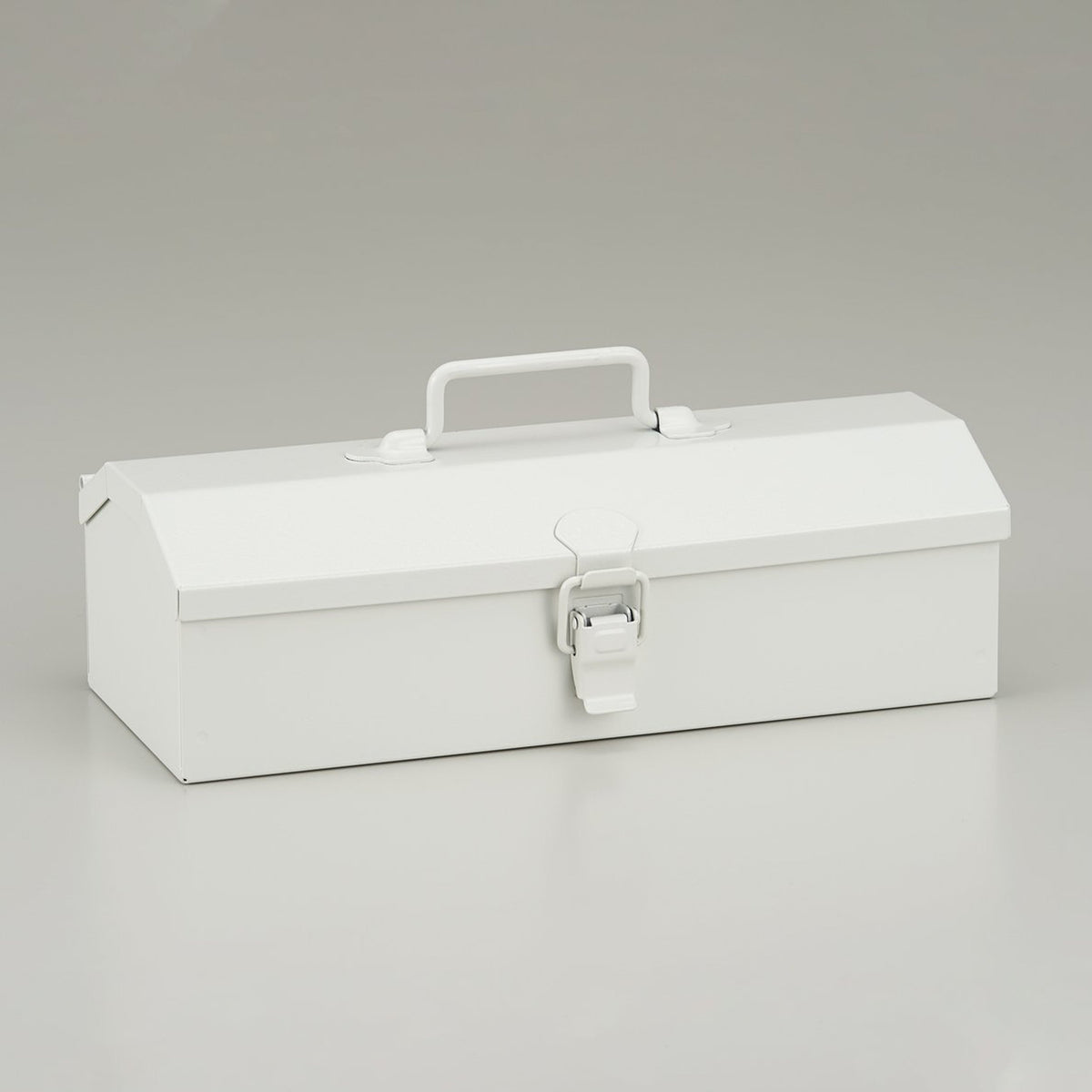 White Toyo Steel Y-20 metal toolbox with top handle and front latch, shown closed against a light gray background.