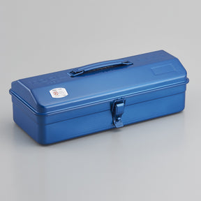Blue Toyo Y-350 steel toolbox with a rounded lid, top carry handle, and single front latch, shown closed on a light gray background.