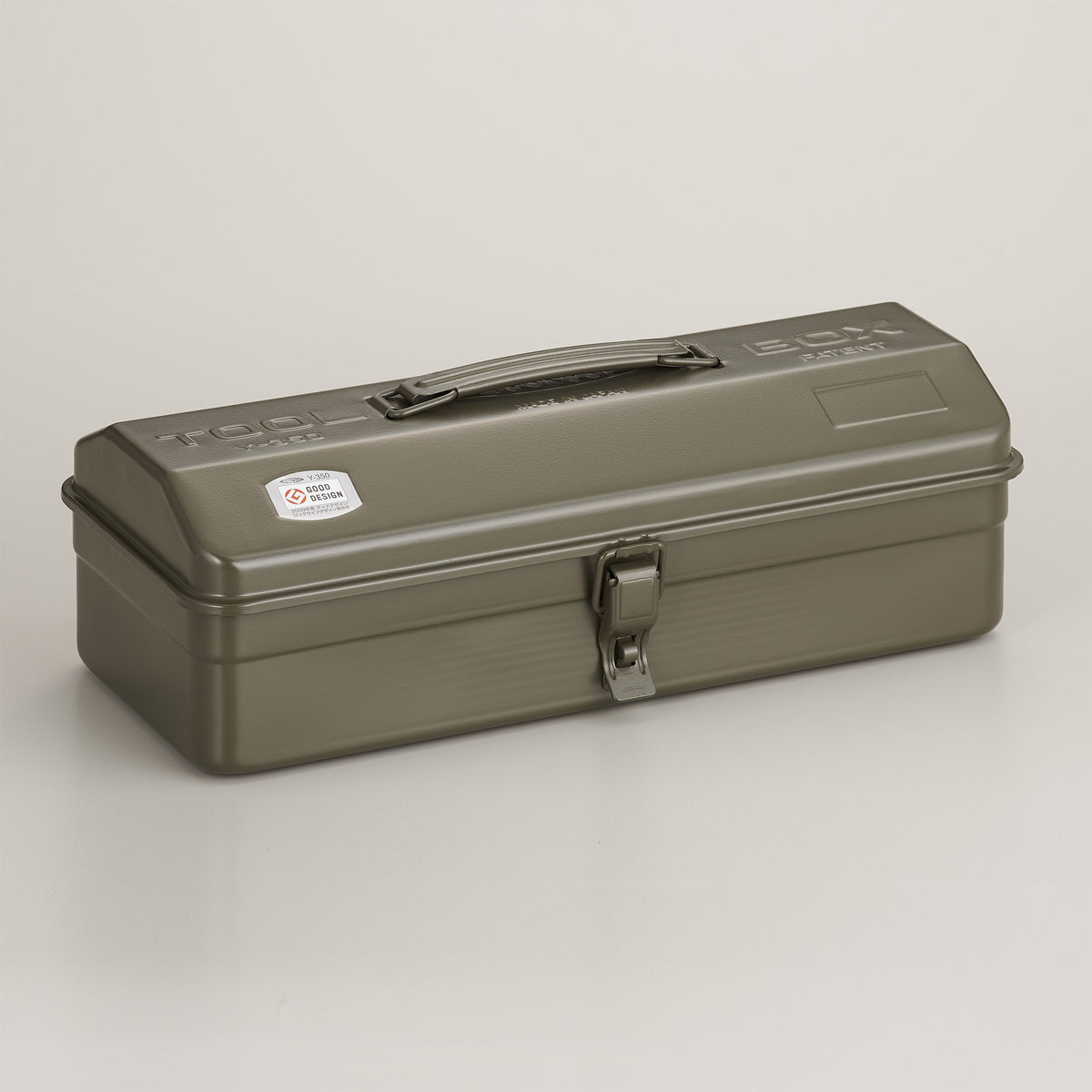 Military green Toyo Y-350 steel toolbox with a rounded lid, top carry handle, and single front latch, shown closed on a light neutral background.