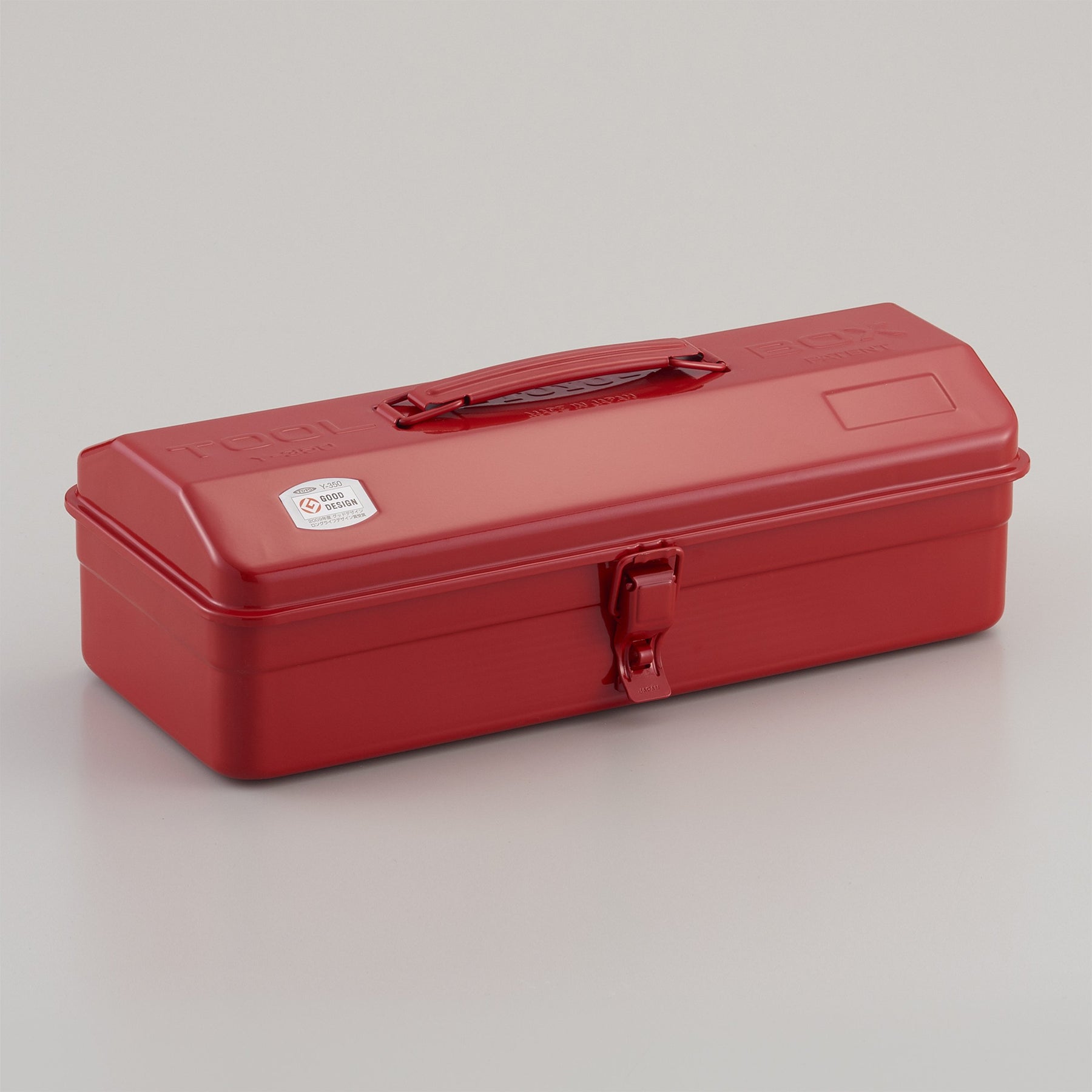 Toyo Y-350 steel toolbox in red with single front latch and top carry handle, shown closed on a neutral background.